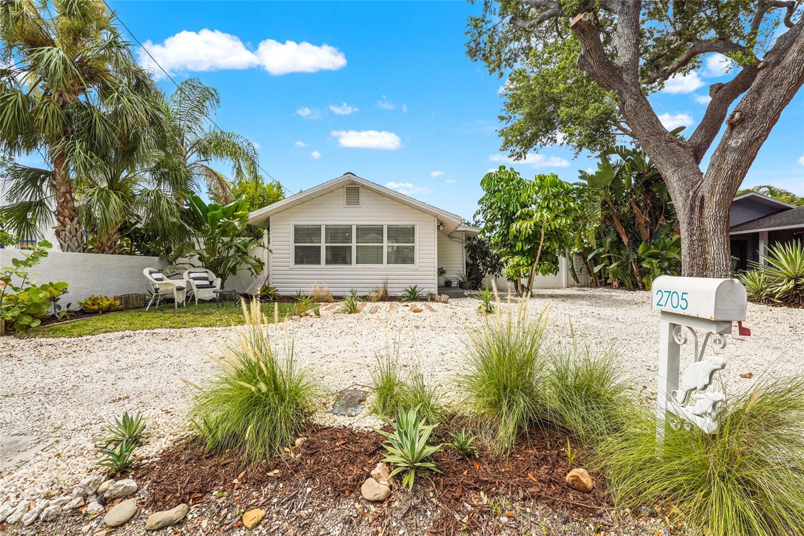 Charming and updated Turnkey Airbnb Bungalow in the Heart of Bradenton – No HOA, No Flood Zone. Welcome to 2705 2nd Ave W, a beautiful and income-producing bungalow in the heart of Bradenton’s historic River District. This active and successful short-term rental currently brings in $40K/year in gross income and offers complete flexibility—no HOA, no deed restrictions, and it’s located outside the flood zone.
Originally built in 1925, this 2 bedroom, 1 bath home offers 1,198 square feet of heated living space plus an added bonus of an oversized light and bright Florida room, all located on a 6,500 sqft lot. Modern upgrades include a 2021 roof, a 2022 electrical overhaul with new main and subpanels (and proper grounding), plus newer appliances from 2024 and 2025. The home is cooled and heated by a central air system.
Inside, you’ll find a light-filled open layout with a spacious Florida room leading out to the covered back lanai with newer pergola from 2022 —ideal for indoor/outdoor living. The fully fenced backyard offers privacy and functionality, with a hot tub, lounge space, covered outdoor dining, mature landscaping, alley access for RV or boat parking, and a powered storage shed that’s perfect for tools, hobbies, or additional gear.
The location is a standout: just 9 miles to the world-famous beaches of Anna Maria Island, less than a mile to downtown Bradenton and the Riverwalk, and only a few miles from both Robinson Preserve and De Soto National Memorial. Sarasota-Bradenton International Airport is just 10 miles away, making travel a breeze. Whether you're looking for a second home, remote owner, or 1031 exchange investor, this property is ready to deliver. Strong income, updated systems, flexible zoning, and an unbeatable location. Schedule your private showing today.