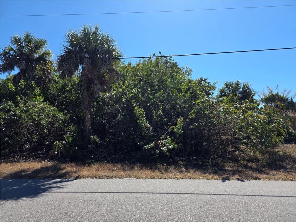 Photo of 698 Lomond Drive, Port Charlotte, FL 33953 (MLS # D6146035)