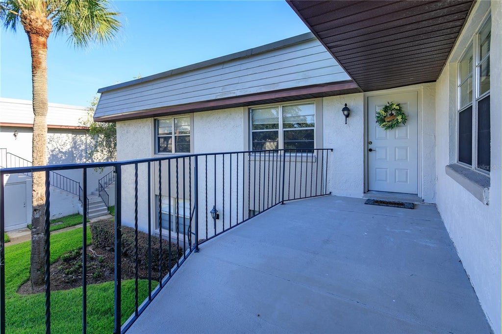 Photo of 122 Windtree Lane #O, Winter Garden, FL 34787 (MLS # G5117173)