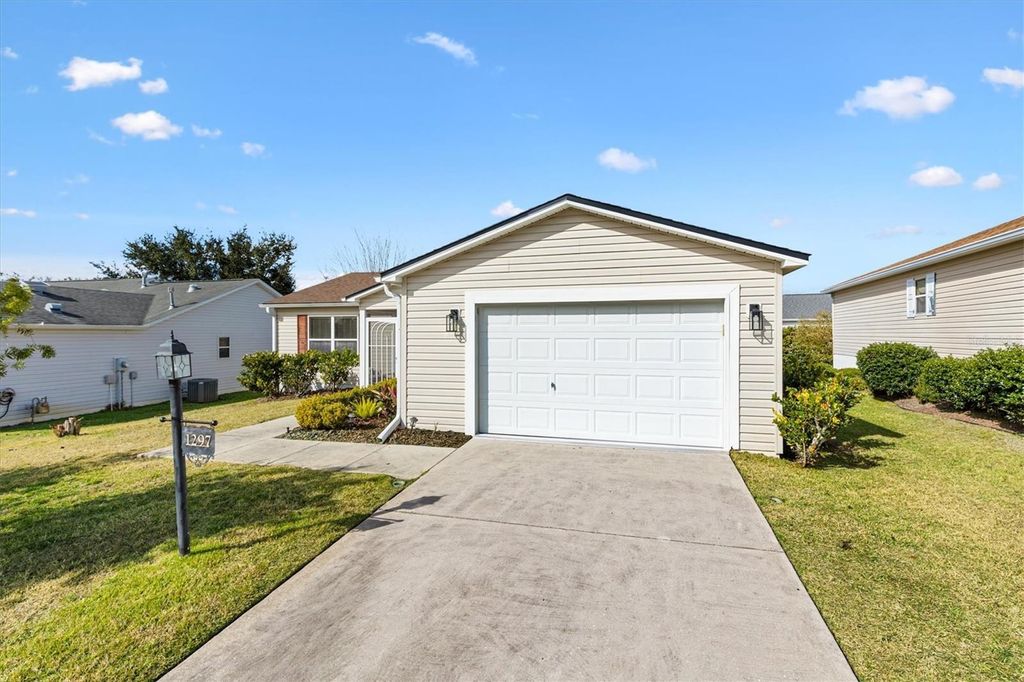 Photo of 1297 Fort Lawn Loop, The Villages, FL 32162 (MLS # OM717159)