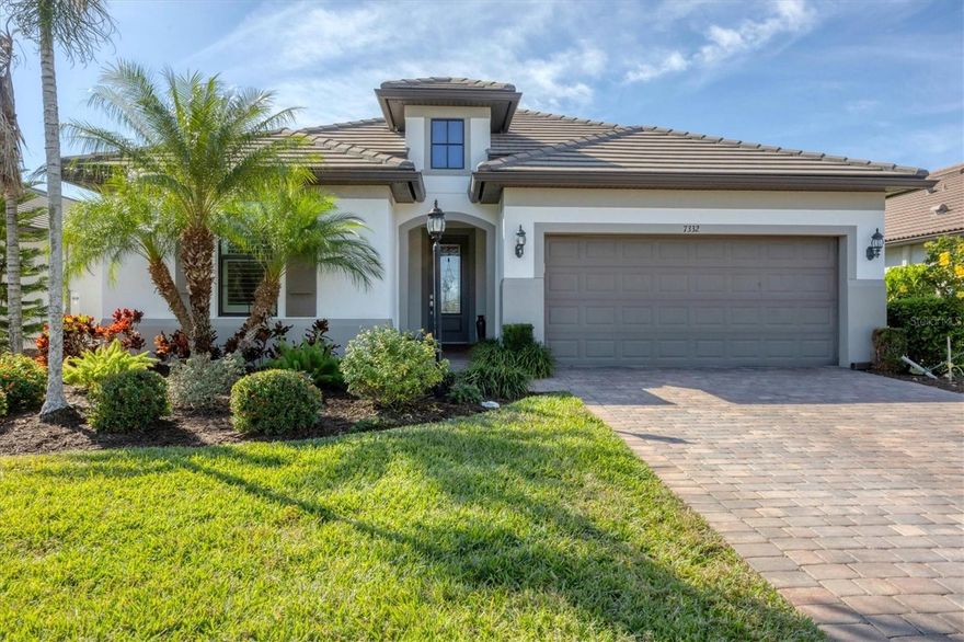 Welcome to a home that captures everything Florida living is meant to be—sun-filled days, effortless indoor–outdoor living, and resort-style relaxation every single day. Perfectly positioned on a premium water lot in the highly coveted Del Webb community of Lakewood Ranch, this impeccably upgraded Summerwood model is more than a home… it’s a lifestyle. From the moment you step inside, you’ll feel the warmth and sophistication of this beautifully curated retreat. The open-concept living area flows with natural light, drawing you toward the heart of the home—a chef-inspired kitchen designed to impress. Here, you’ll find 42" soft-toned cabinetry, granite countertops, a gas cooktop, built-in oven, and a custom pantry. A large center island makes this space the ultimate hub for entertaining and gathering with friends and family. Step outside and experience the beauty of true Florida outdoor living. Your private backyard sanctuary features a sparkling pool and spa, a complete outdoor kitchen, and lush tropical landscaping that frames the water view. Whether you’re hosting sunset cocktails, enjoying a quiet morning coffee, or taking a moonlit swim, this space promises unforgettable moments every day. Inside, the home offers 2 bedrooms, 2 full baths, and a versatile den—ideal for a home office, fitness area, hobby room, or cozy reading retreat. The owner’s suite is a personal haven featuring a spa-inspired bath with garden tub, walk-in tiled shower with bench seating, dual vanities, and a custom-designed walk-in closet with built-in shelving. This home shines in both beauty and peace of mind with Impact Resistant windows and a whole-house Generac generator—ensuring comfort and security no matter the season. Best of all, you’ll be living in Del Webb Lakewood Ranch, a premier 55+ community often described as a “cruise ship on land.” Enjoy world-class amenities, vibrant social offerings, and the unbeatable energy of Lakewood Ranch—the nation’s #1 multi-generational master-planned community. This is more than a home—it’s your own slice of paradise. Don’t miss this rare opportunity to live the Florida lifestyle you’ve been dreaming of.