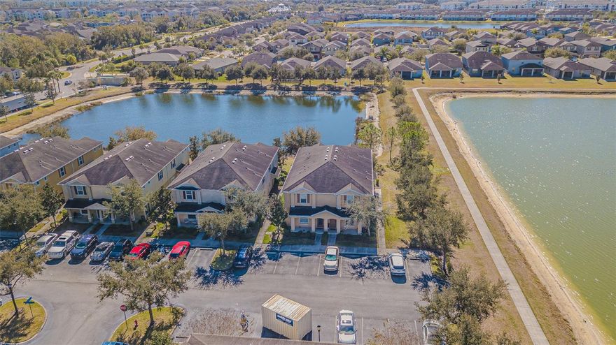 Discover Magnolia Park! Affordable luxury awaits in this 2 BR, 2.5 bath corner townhome located in a secure, gated community near all the conveniences you love. This 1,320 square foot beauty has a great LAKE VIEW from the PATIO, living room, and master bedroom. Park in your assigned parking spot right in front, and it's a short stroll down the sidewalk to the front door. Enter the WIDE OPEN FLOOR PLAN to an inviting living room and kitchen. The spacious living room has plenty of windows offering TONS OF NATURAL LIGHT and plenty of space for any furniture arrangement. The open kitchen features sparkling, new granite counters, wood cabinets, breakfast bar, and huge WALK-IN PANTRY. A convenient half bath and handy storage closet complete the first floor. Head upstairs to the SPLIT FLOOR PLAN where everyone has their own space. The master bedroom boasts a WALK-IN CLOSET and suite bathroom with garden tub shower and dual vanity. Magnolia Park is just minutes from I-75, I-4, and the Selmon Expressway, with easy access to shopping, dining, and the mall. Enjoy community amenities including a pool and splash pad, playground, and basketball court.

Don’t miss this amazing opportunity!