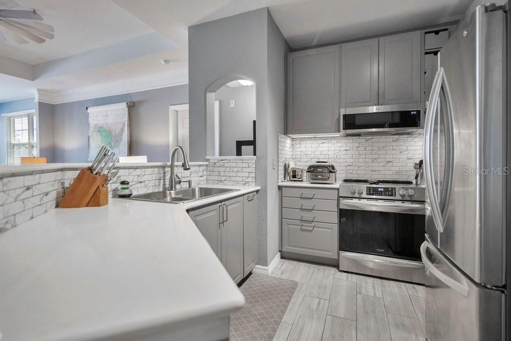 Photo of 3428 Soho Street #305, Orlando, FL 32835 (MLS # O6399910)