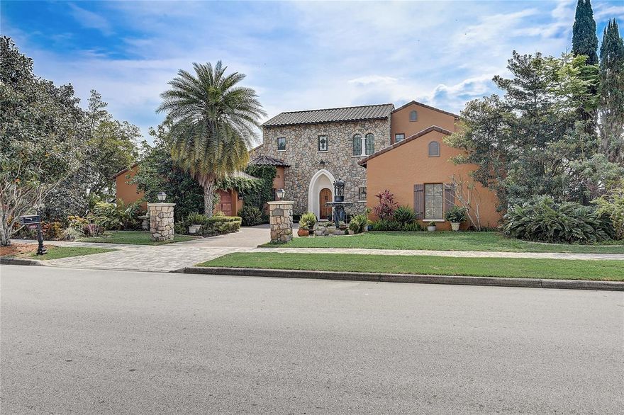 OWNER FINANCING IS AVAILABLE! Welcome to 16538 Bolsena Dr, where modern Tuscan luxury meets Floridian tranquility. This is not just a home; it's a lifestyle statement. Just picture this: a private, guard-gated community sprawling across 1,900 pristine acres, with your next home sitting right at its heart. Built in 2007, this custom Tuscan villa is elegance redefined, encompassing 4,319 square feet of unparalleled luxury.

Your home boasts five spectacular bedrooms and six bathrooms, offering ample room for family and guests alike. Entering the residence, your eyes are met with soaring ceilings, architecturally interesting beams, and the rich allure of travertine and hardwood flooring underfoot. Here, every detail is a work of art.

Experience the grandeur of the gourmet kitchen, complete with a gas cooktop and upscale Wolf appliances, seamlessly blending form and function. A double-sided gas fireplace, warming both the interior and the outdoor pool deck, set the stage for both intimate family gatherings and grandiose entertaining.

A dedicated wine cellar holds up to 600 bottles for wine aficionados, ready for tasteful celebrations or quiet evenings savoring your favorite vintages. And speaking of evenings, imagine retiring to the luxury of your expansive private master suite, your haven away from the world.

Venture outside, where a sumptuous pool with a luxury shower is surrounded by travertine decking. Set against the backdrop of the lake, this space is perfect for soaking up the Florida sunshine or spending serene evenings watching the sun dip below the horizon. The home sits on a double lot, offering the flexibility to split and expand the home or build an additional property if you wish.

Located minutes from the buzzing lifestyle of Winter Garden, you're never far from the freshest farmer's markets, fabulous dining experiences, and top-tier shopping. Yet, despite its convenient location, your home sits comfortably outside the tourist district and within easy reach of theme parks, Cocoa Beach, the Gulf Coast, and the buzzing city of Orlando.

Here, life is not only lived; it's enjoyed to its fullest. With a golf course designed by Nick Faldo, tennis courts, a gym, resort-style pools, spas, and a 75,000 sq ft clubhouse housing a private restaurant, your lifestyle is one of unrivaled luxury and convenience.

Priced to make your dreams come true swiftly and with owner financing available, 16538 Bolsena Dr is not just a property. It's the embodiment of an aspirational lifestyle. Make it yours today.