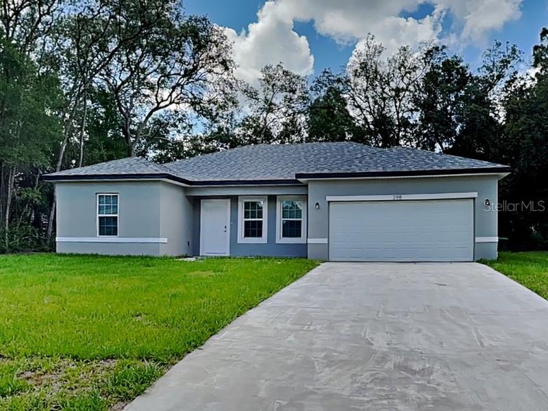 Brand new 4BR/2BA home in Citrus Springs! Featuring 1,580 sq. ft. of open-concept living, this home offers a modern kitchen with granite counters, stainless steel appliances, and 42'' cabinets. All-tile flooring throughout, spacious primary suite with double vanity, and a 2-car garage. Concrete block construction for durability and energy efficiency. No HOA fees—move-in ready!