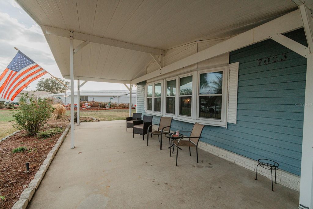 Photo of 7023 Tamarind Drive, Lake Wales, FL 33898 (MLS # TB8480014)