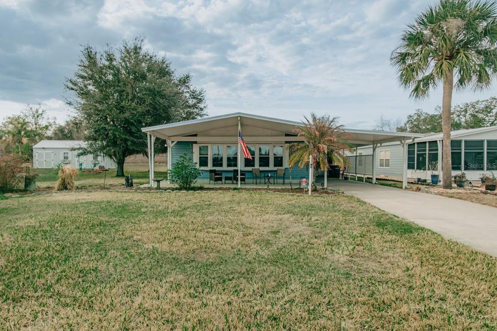 Photo of 7023 Tamarind Drive, Lake Wales, FL 33898 (MLS # TB8480014)