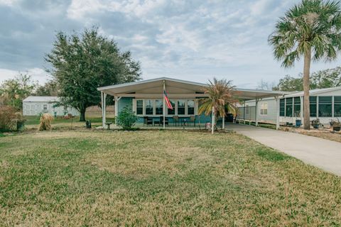 Photo of 7023 Tamarind Drive, Lake Wales, FL 33898 (MLS # TB8480014)