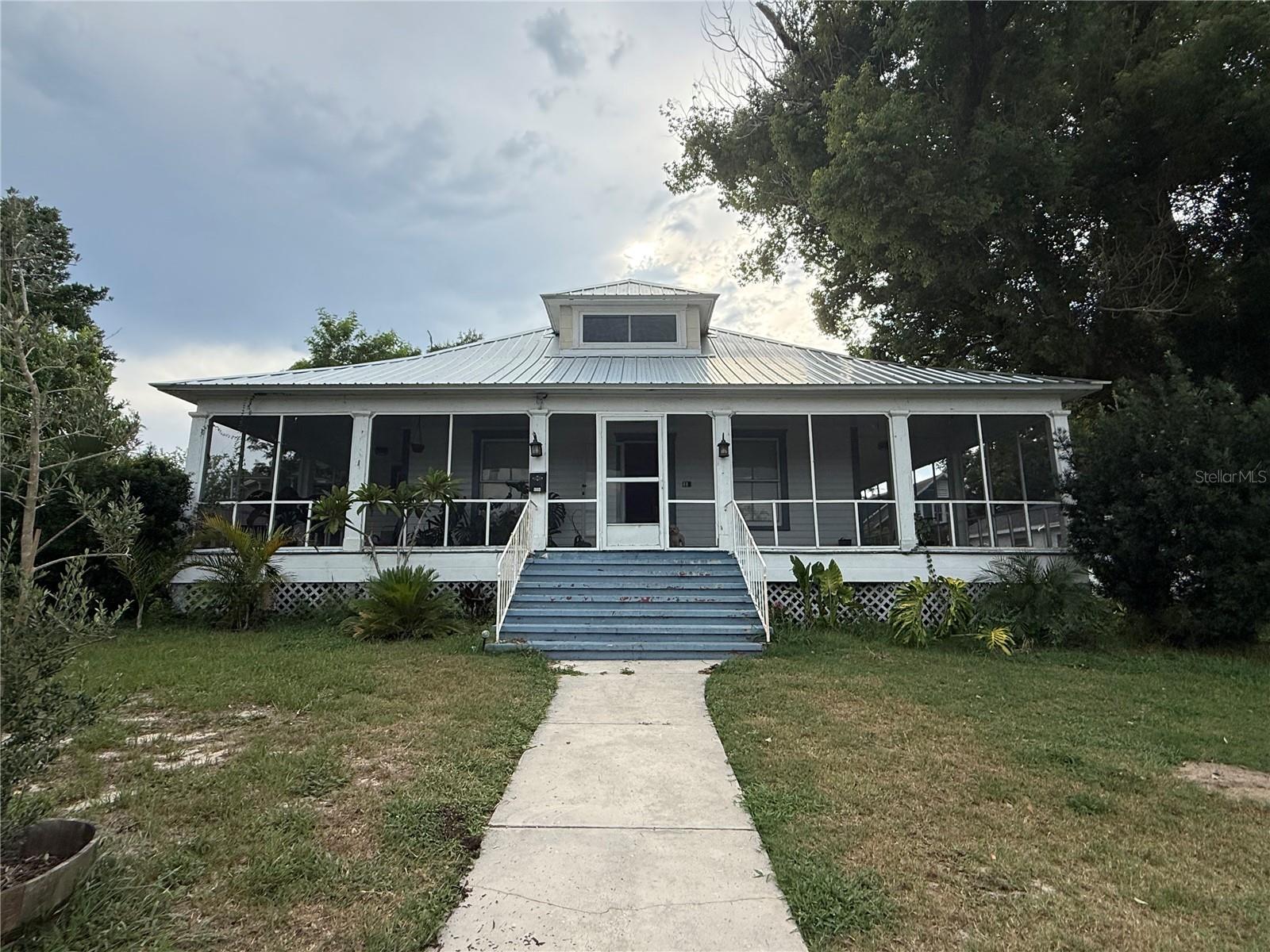 Welcome to this beautifully updated 2-bedroom, 2-bathroom home located in the heart of Downtown Winter Haven! This charming, historic property blends timeless character with modern upgrades, offering the perfect combination of comfort and style. Step outside and enjoy everything downtown has to offer—restaurants, shopping, and entertainment are just a short drive away. Plus, you’ll love having a scenic park with a playground directly across the street. Inside, the home features a spacious layout with two comfortable bedrooms, two full bathrooms, and updated finishes throughout. Thoughtful upgrades have preserved the home’s original charm while providing modern-day convenience. Don’t miss your chance to live in one of Winter Haven’s most desirable locations!
Please Note: This is a shared property. The home is a two-story building that has been separated into two units. This listing is for the downstairs house only. There is a separate tenant living upstairs with their own private entrance.