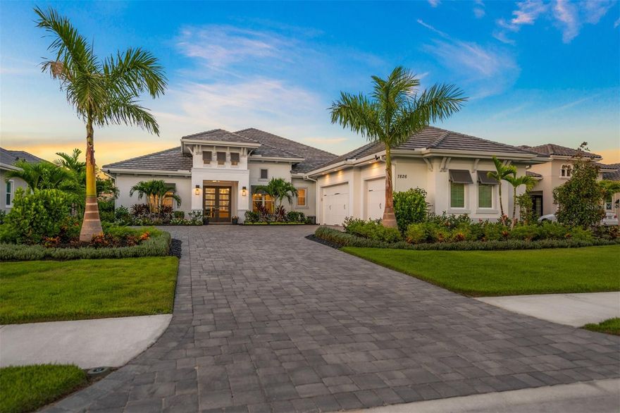 Experience immediate luxury in this beautifully furnished, turn-key and truly "move-in-ready" residence built by STOCK Signature Homes, situated in the exclusive Lake Club Community of Lakewood Ranch, Florida. The magnificent Modified Sterling III exemplifies the epitome of Florida living, allowing you to relish the simplicity of moving into a practically new-construction home, loaded with meticulous upgrades and modifications in one of the finest communities that Lakewood Ranch/Sarasota offers. This beautiful home, featured with the included furniture package depicted in the photos, presents an impeccable balance between elegance and functionality. It showcases a popular floor plan that maximizes space efficiently, featuring soaring ceilings and including 4 bedrooms (3 ensuite), 4 full bathrooms, a large study with upgraded French doors — easily convertible to a fifth bedroom, and a generously sized bonus room located at the rear. The fully optimized three-car, side-loading garage is complemented with epoxy flooring, cabinets, overhead storage, and a workbench.
Every window in this magnificent residence is fitted with impact glass, and the home sports an upgraded British West Indies elevation with classic colors. The neutral and open floorplan interior welcomes you warmly through the double doors. The grand room, marked by 13 ft ceilings and 10 ft sliding doors, leads to a spectacular outdoor space, seamlessly blending indoor and outdoor living. The dining area, seamlessly connected to the main living quarters, boasts an upgraded wet bar complete with a wine fridge, sink, and soft-closing cabinets, highlighted by a striking new chandelier. The gourmet kitchen is a culinary enthusiast's dream, featuring soft-close wood cabinets, crisp quartz counters, a marble backsplash, and a substantial island, providing additional cabinet storage and bar seating. The kitchen is furnished with premium stainless KitchenAid appliances and a natural gas cooktop, ensuring a delightful cooking experience. Every bedroom guarantees privacy and comfort, with the primary suite offering French doors to the pool and spa and two sizable closets. The primary bath, a sanctuary of luxury, provides dual sinks, soft-close wood cabinetry, quartz counters, a beautiful soaking tub, and a large walk-in shower. Outside, the lanai is a masterpiece of design with a gas fireplace, a top-notch outdoor kitchen, and an expansive heated pool with a spa, set against the backdrop of lush, private landscaping viewed through a panoramic clear-view screen. Located in a stunning gated community, the Lake Club offers amenities that rival a five-star resort, including exquisite resort-style pools, a majestic clubhouse with a restaurant, a state-of-the-art fitness center, tennis, pickleball, and basketball courts, a dog park, and a playground. Situated in a picturesque neighborhood characterized by fabulous schools, abundant shopping and dining options, and proximity to world-class beaches, this residence is the embodiment of Florida living at its finest. Don't miss the opportunity to experience unparalleled luxury; schedule your private tour today!