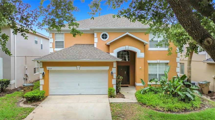 Welcome to Emerald Island Resort, one of the most sought-after vacation home communities in the Disney area. This fully furnished 7-bedroom, 4.5-bath pool home offers 2,881 square feet of living space and is zoned for short-term rentals, making it an excellent choice as a vacation home, investment property, or primary residence. The thoughtfully designed floor plan features two primary suites, including one on the first floor, making it ideal for large families and multi-generational groups. The spacious kitchen offers ample counter space, a breakfast bar, and opens to the family room with soaring ceilings, while separate living and dining areas provide plenty of room for entertaining. Step outside to your private screened pool and heated spa, complete with a covered lanai and a fully equipped outdoor kitchen featuring a built-in grill, burners, sink, and prep area. Whether relaxing after a day at the parks or entertaining guests, this outdoor living space is a standout feature rarely found in competing homes. Additional highlights include laminate flooring in the bedrooms, a garage game room, a roof replaced in 2023, downstairs AC replaced in 2021, and a two-car garage. The home is being sold fully furnished and turnkey. Emerald Island Resort offers an impressive list of amenities including a 24-hour guarded entrance, clubhouse, resort-style pool and spa, fitness center, sauna, tennis courts, sand volleyball court, playgrounds, tiki bar, walking trails, and more. All of this is located just minutes from Walt Disney World, shopping, dining, golf, and major highways. Priced to sell and offering exceptional value in today's market, this is an opportunity you won't want to miss.