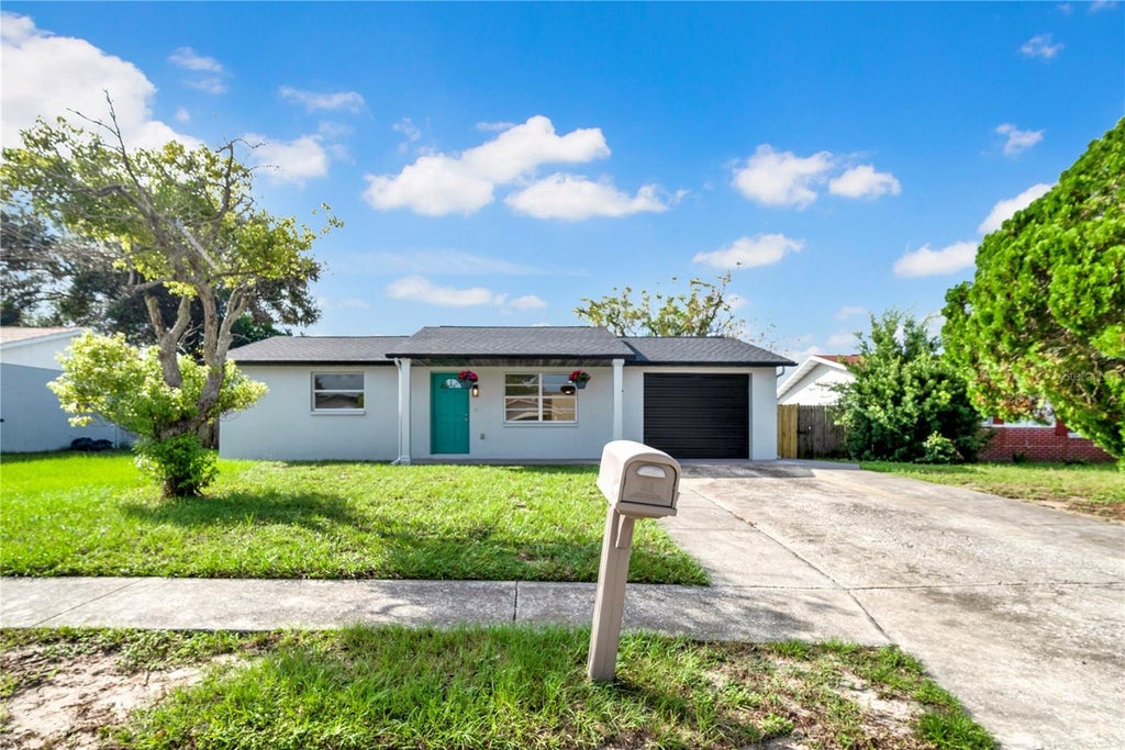 Photo of 6318 Baldwyn Avenue, New Port Richey, FL 34653 (MLS # W7887187)
