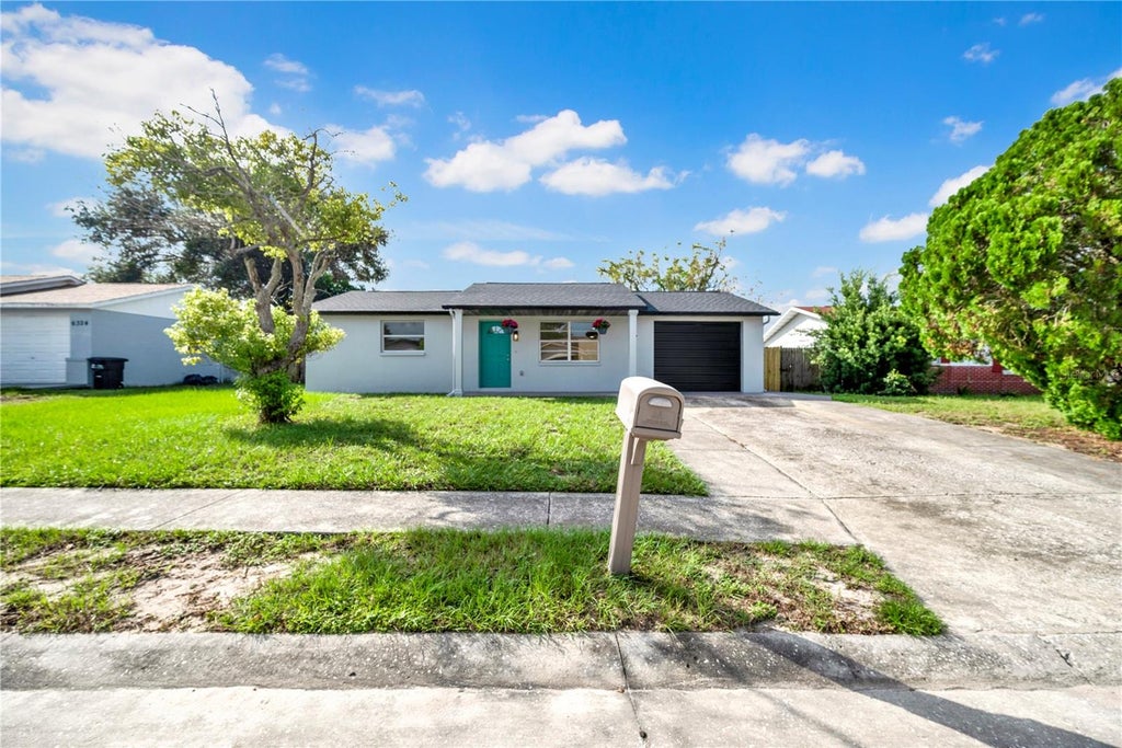 Photo of 6318 Baldwyn Avenue, New Port Richey, FL 34653 (MLS # W7887187)
