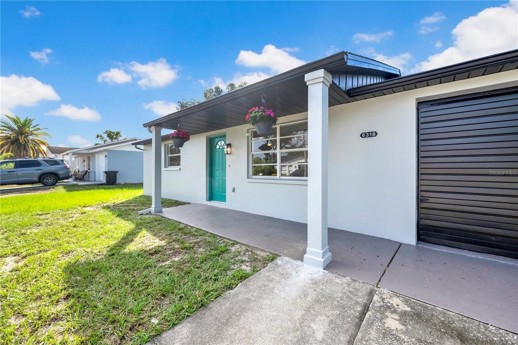 Photo of 6318 Baldwyn Avenue, New Port Richey, FL 34653 (MLS # W7887187)