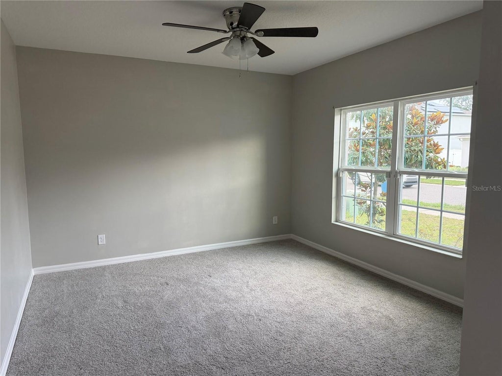Photo of 911 Avenal Lane, Davenport, FL 33837 (MLS # OM726291)