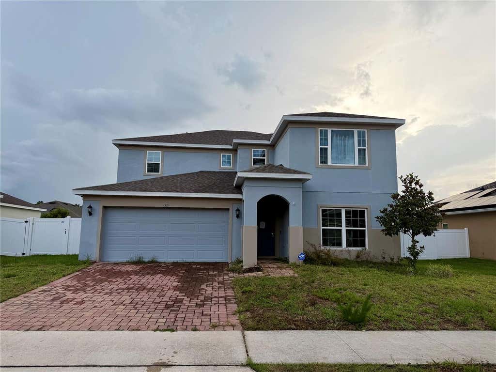 Photo of 911 Avenal Lane, Davenport, FL 33837 (MLS # OM726291)