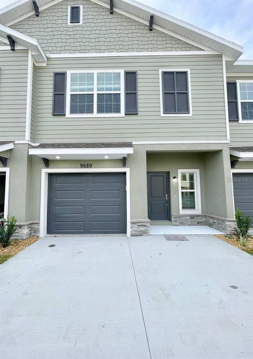 Discover the epitome of contemporary living in this newly constructed townhome in the heart of Riverview, FL. With a perfect blend of sophistication and functionality, this residence is designed to elevate your lifestyle. Step into luxury with wood-look tile flooring that graces the entire first level, offering durability and a stylish aesthetic. The open floorplan seamlessly connects the living room, dining room, and kitchen - a perfect setting for both intimate gatherings and entertaining. The kitchen is a chef's dream, featuring stone countertops, soft-close cabinets, stainless steel appliances, and a generously sized island. Storage is a breeze with under-the-stairs storage and the convenience of a one-car garage. Enjoy the Florida breeze on your screened lanai, creating a perfect outdoor retreat. This community is not just a home; it's a lifestyle. Take advantage of the amenities, including a community pool for refreshing dips and a dog park for your furry friends. Pets are welcome at the owner's discretion - one pet, 25lb max. In addition to the advertised base rent, all residents are enrolled in the Resident Benefits Package (RBP) for $50.00/month which includes HVAC air filter delivery, credit building to help boost your credit score with timely rent payments, utility concierge service making utility connection a breeze during your move-in, and much more! More details upon application. Vacant/Available Now