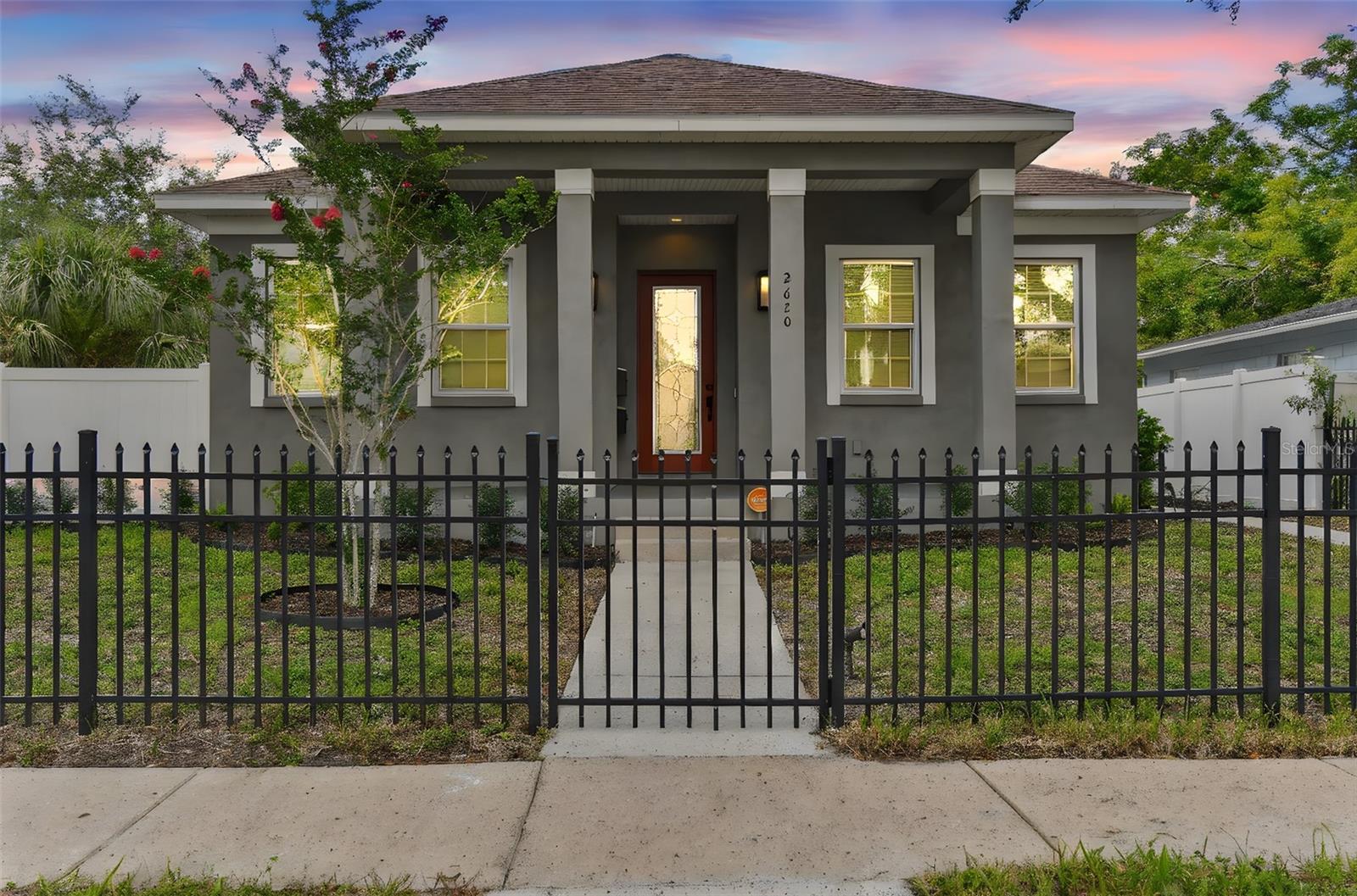 Nestled in the vibrant heart of the Grand Central and Warehouse Districts, this stunning 2018 Tiger Construction home offers a spacious 1,944 sq. ft. featuring 3 bedrooms, 2 bathrooms, and a 2-car garage. Included is a 441 sq. ft. income-producing studio apartment on a generous 50x127 lot.
Natural light floods through the glass front entry door, illuminating the living area with its custom trim details and soaring 10-foot ceilings—creating an open, bright, and welcoming space. The open-concept floor plan highlights a beautiful kitchen island topped with Quartz countertops that gracefully separates the kitchen and living areas. Artisan epoxy floors, classic shaker cabinetry, and stainless steel appliances combine to create a kitchen that’s both elegant and highly functional.
The formal dining room is complemented by an attached Butler’s Pantry/Coffee Bar, perfect for entertaining. The primary ensuite serves as a private owner’s retreat with ample space, multiple walk-in closets, a walk-in shower with floor-to-ceiling tile, and a double vanity. All three bedrooms feature generously sized closets for added convenience.
Additional features include PGT impact-rated windows and doors throughout the home, offering enhanced energy efficiency, security, and peace of mind. A large laundry room equipped with a sink and washer/dryer adds to the home’s everyday convenience. The property is also equipped with a Vivint Alarm System and smart home features.
The separate studio apartment, last rented at $1,400/month, includes its own full kitchen, bathroom, and laundry with washer and dryer—ideal for generating income or hosting guests.
Within easy reach of an eclectic mix of local hotspots—art galleries, shops, restaurants, and bars—this home places you right in the center of the action.
Contact me today to schedule your personal tour of this exceptional property.