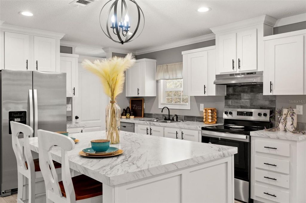 Photo of 14247 Hurricane Drive, Weeki Wachee, FL 34614 (MLS # W7881546)