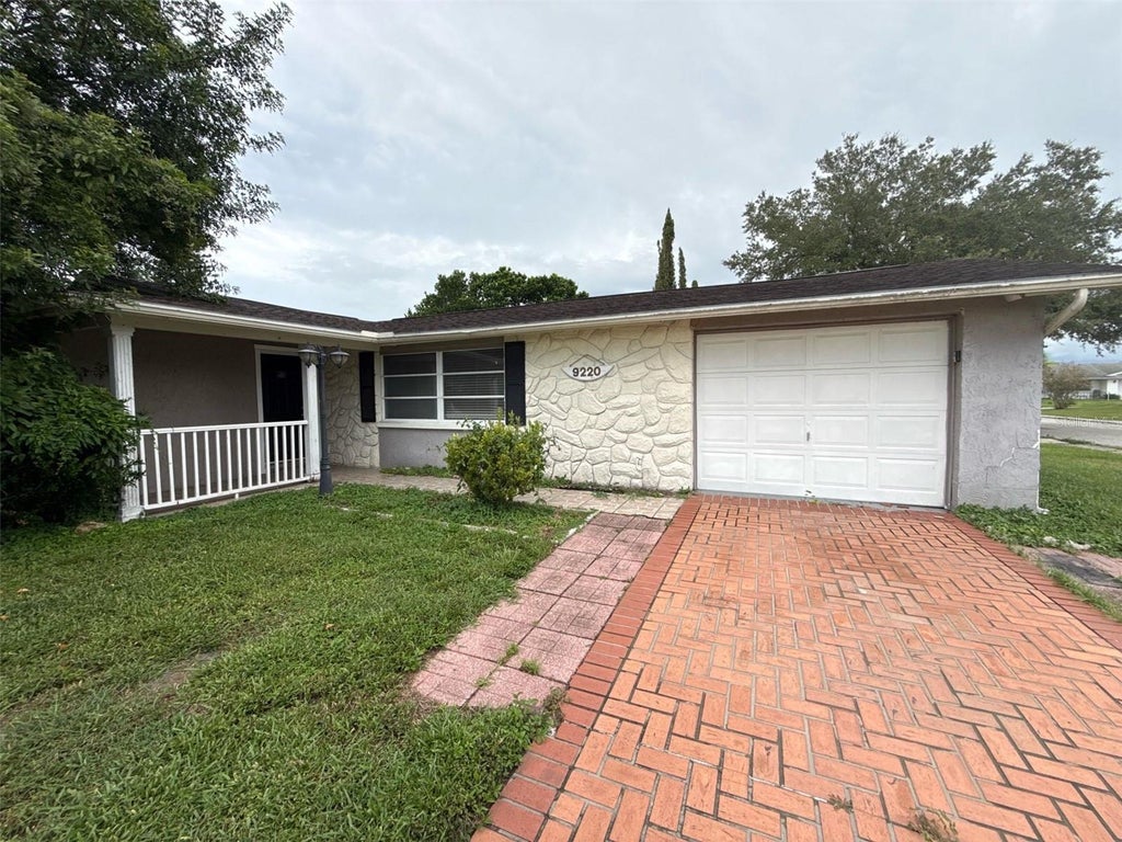 Photo of 9220 Lido Lane, Port Richey, FL 34668 (MLS # O6438930)