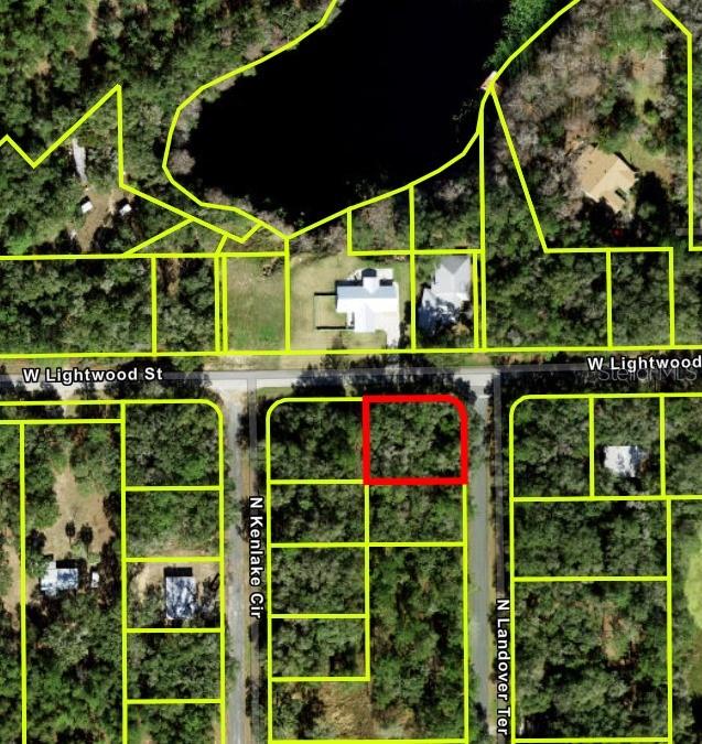 Beautiful Corner Vacant Lot in Citrus Springs. Water and electricity Available. Near by great houses. Asphalt in both sides. High and dry lot.