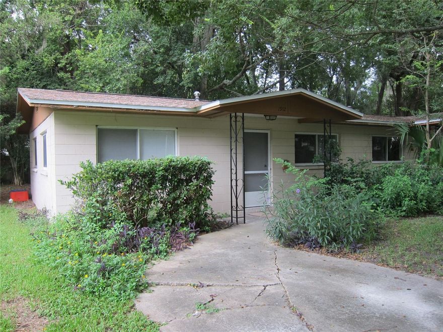 Inlelside 2 Br, 1 bath duplex close to campus and downtown. Built in 1963. 737 sq. ft. no carpet --terrazzo floors. laundry room with washer/dryer connection.