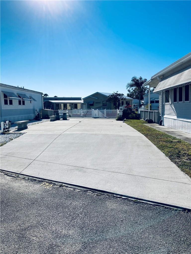 Welcome to the highly sought after 55+ community of Outdoor Resorts!! Fantastic opportunity to acquire a ****WONDERFUL VACANT LOT WITH EXTENDED DECK AND CANAL FRONTAGE!!**** Outdoor Resorts is a one of a kind guard gated community offering great amenities: a 9-hole par 3 golf course, 2 swimming pools, 8 bath houses, laundry facility, shuffleboard, horseshoes, pickle ball, access to Lake Davenport with dock and boat slip, and a clubhouse where owners gather for cards, bingo, suppers, dances, arts/crafts, and morning coffee. The low quarterly HOA fees of $691 include water, sewer, trash, basic cable TV and ground maintenance…..and you OWN THE LAND. Come and enjoy this fantastic, affordable lifestyle! Please remember 55+ and one pet rule! The park benefits from being close to medical facilities, restaurants, grocery stores, and easy driving to all the theme parks. CASH offers only please!