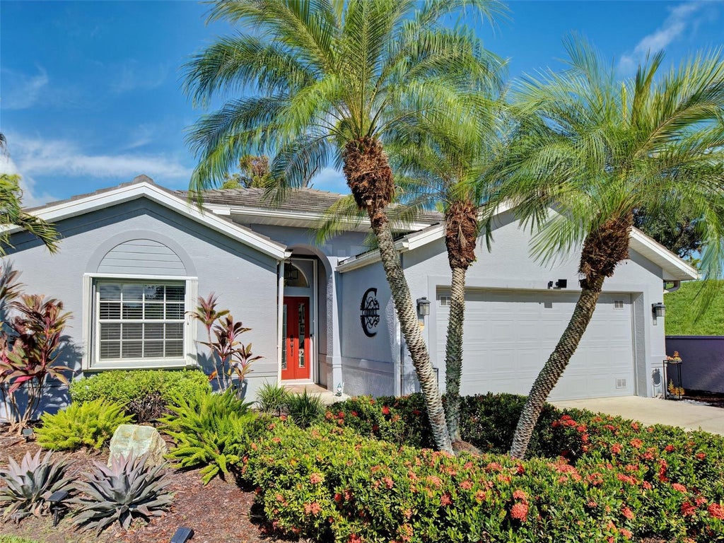 Photo of 3199 Village Lane, Port Charlotte, FL 33953 (MLS # C7530346)