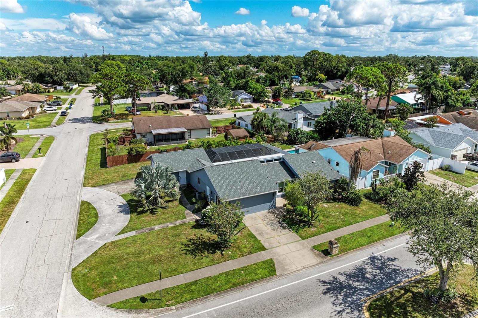 Welcome to this beautifully reimagined Lake Sarasota residence, where every detail has been thoughtfully upgraded to blend comfort, craftsmanship, and modern living. Completely remodeled in 2023, this 3-bedroom, 2-bathroom home invites you in with high ceilings, modern fixtures, and luxury vinyl flooring throughout, setting a clean and cohesive tone. The kitchen, tastefully redesigned with quartzite countertops, stainless steel appliances, and custom finishes, proves that style and efficiency can go hand in hand — a space as practical as it is beautiful.The bonus family room adds warmth and character, featuring a custom-built fireplace surrounded by built-in storage, perfect for gathering, relaxing, or simply enjoying the glow of home. Each guest bedroom offers built-in closets and shares a designer bathroom adorned with a custom-tiled shower, quartz countertops, and a modern vanity that feels fresh and refined.
On the opposite side of the house, the primary suite is a serene retreat featuring a custom walk-in closet, and a luxurious ensuite bathroom, showcasing a porcelain slab shower, dual vanities, and built-in shelving — a space designed for relaxation and calm. Step outside to your screened-in pool and spa, surrounded by a secure safety fence for peace of mind. Whether it’s a quiet morning swim or an evening under the stars, this backyard is your personal escape. Updates continue throughout: a new roof (2023), and hurricane-impact windows to be installed prior to closing, ensuring long-term comfort and value. The laundry room stands out with new washer and dryer, quartzite counters, a full backsplash, and utility sink, combining style with functionality. Situated on a corner lot with a circular driveway and two-car garage, this home offers curb appeal and convenience — all within one of Sarasota’s most sought-after communities, free from HOA or CDD fees.
Discover a home that’s not just updated, but reimagined for modern living — elegant, move-in ready, and perfectly positioned for your next chapter.