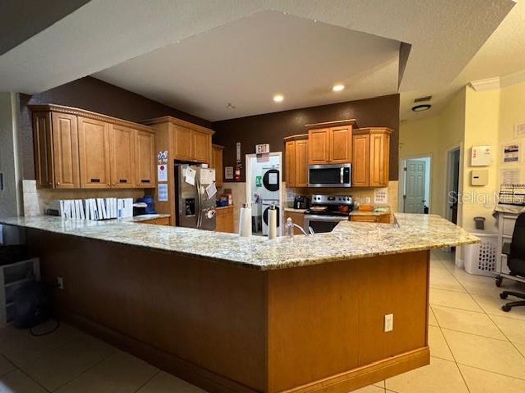 Photo of 12140 Murray Avenue, Largo, FL 33778 (MLS # TB8465898)