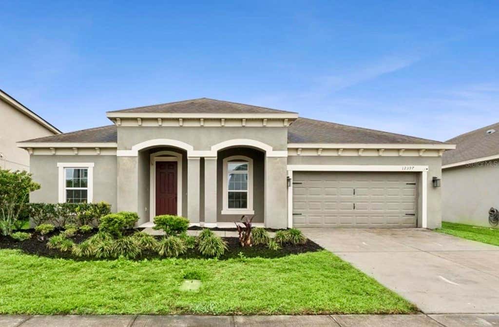 Photo of 12397 Stone Bark Trail, Orlando, FL 32824 (MLS # O6429972)