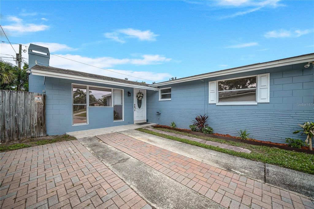 Photo of 9151 Fairweather Drive, Largo, FL 33773 (MLS # O6398140)