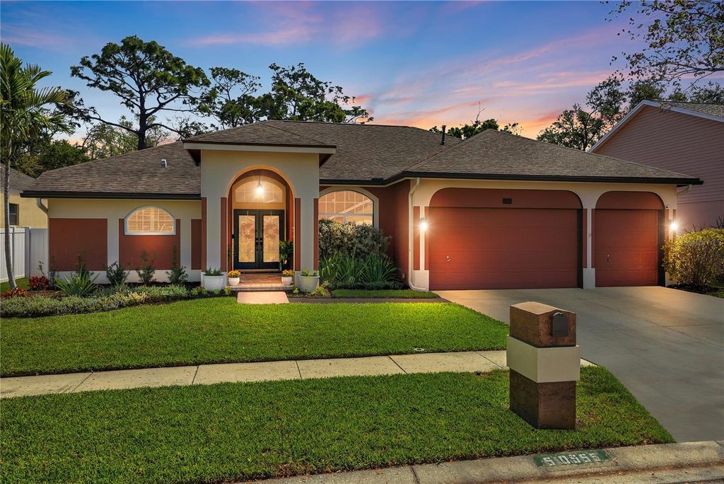 Photo of 10555 Shady Oak Lane, Seminole, FL 33777 (MLS # TB8486000)