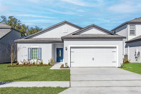 Photo of 13279 Tula Loop, Astatula, FL 34705 (MLS # TB8364464)