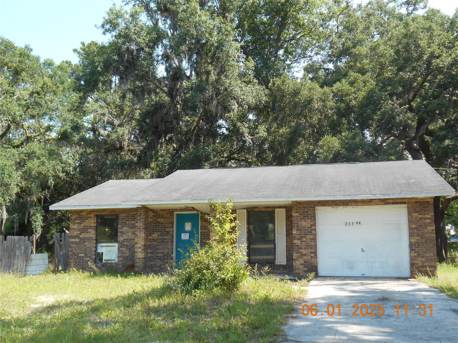 INVESTOR ALERT! Brick home on 1 Acre. Minutes from center of Old Town and Suwannee River for boating and fishing activities. Built 1992, 2BR 1BA home with enclosed garage. Property need repairs and is being sold AS IS.