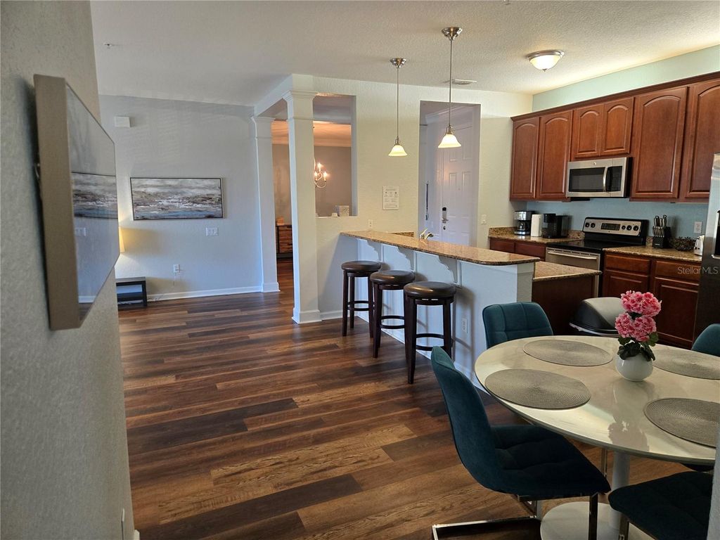 Photo of 5049 Shoreway Loop #30101, Orlando, FL 32819 (MLS # O6419705)