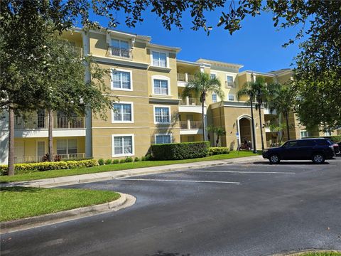 Photo of 5049 Shoreway Loop #30101, Orlando, FL 32819 (MLS # O6419705)