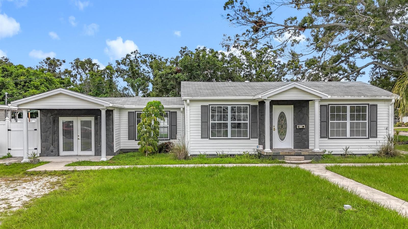 Welcome to your next home in vibrant St. Petersburg—just 15 minutes from downtown’s world-renowned dining, museums, shopping, and nightlife!This spacious and updated 3-bedroom, 2-bath home offers comfort, convenience, and room to spread out. Featuring a newer A/C system (replaced in 2025) and a permitted remodel and addition completed in 2003, the home blends modern updates with lasting value.Step outside to enjoy a huge backyard—great for entertaining, relaxing, or letting pets roam free behind the brand-new vinyl privacy fence. There's plenty of room to add a pool, garden, or even a workshop.Inside, the open-concept kitchen connects to the living area with a functional pass-through—great for entertaining or staying connected during your favorite shows or game nights.Additional features include:Over 9,000 sq ft of landHome layout for multi-generational livingAll appliances includedQuick access to I-275—beaches, downtown, and Tampa Bay all within 30 minutesThis is more than just a rental—it’s a place to call home. Ready for move-in and ready for you!