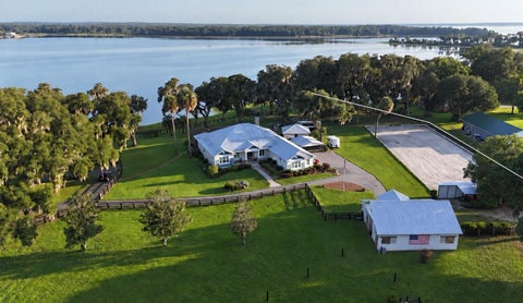 Photo of 11811 SE Sunset Harbor Road, Weirsdale, FL 32195 (MLS # OM731796)