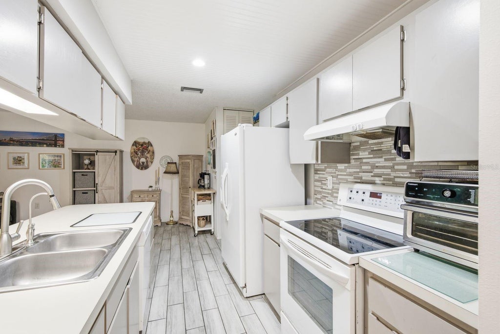 Photo of 10624 Encino Court, Port Richey, FL 34668 (MLS # TB8541012)