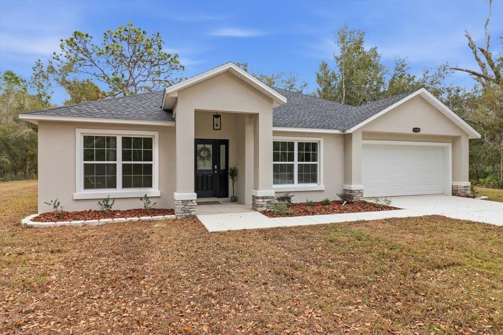 Photo of 12988 W Baltic Ivy Street, Crystal River, FL 34428 (MLS # OM716782)