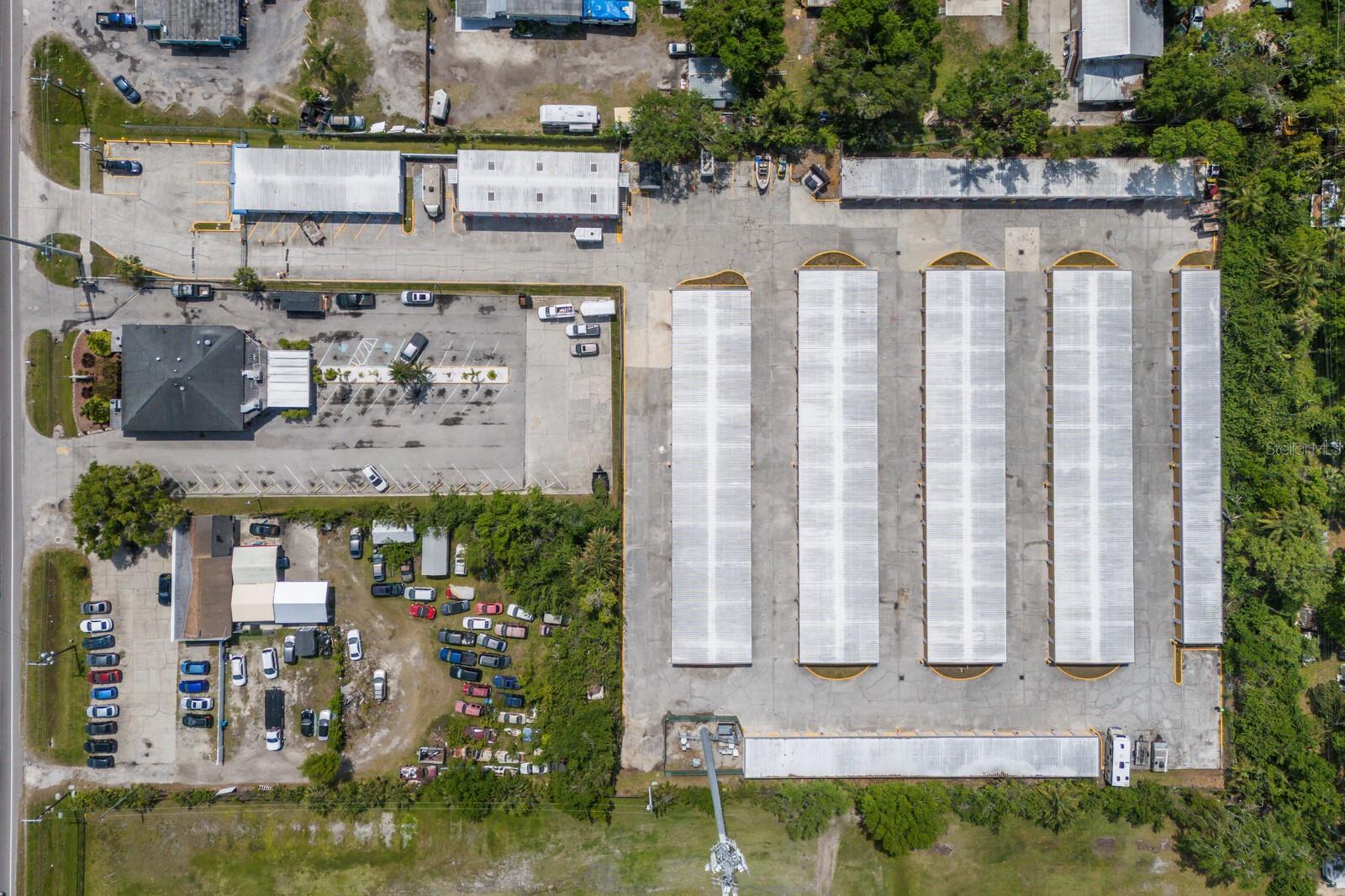 Nine concrete building self-storage facility in active area of Manatee County. Over 3 acres of prime commercial property. Currently 2 office spaces with possibly for an additional office space. Self-Storage units include 144 units 10x20; 36 units 10x10; 20 units 20x20; various other sizes equaling 265 Units in total PLUS 16 parking spaces. In addition, there is a cell tower leased on the property. New Roof, 2023 Replace downspouts and gutters, Painted 2023, Paving 2023. Great location!