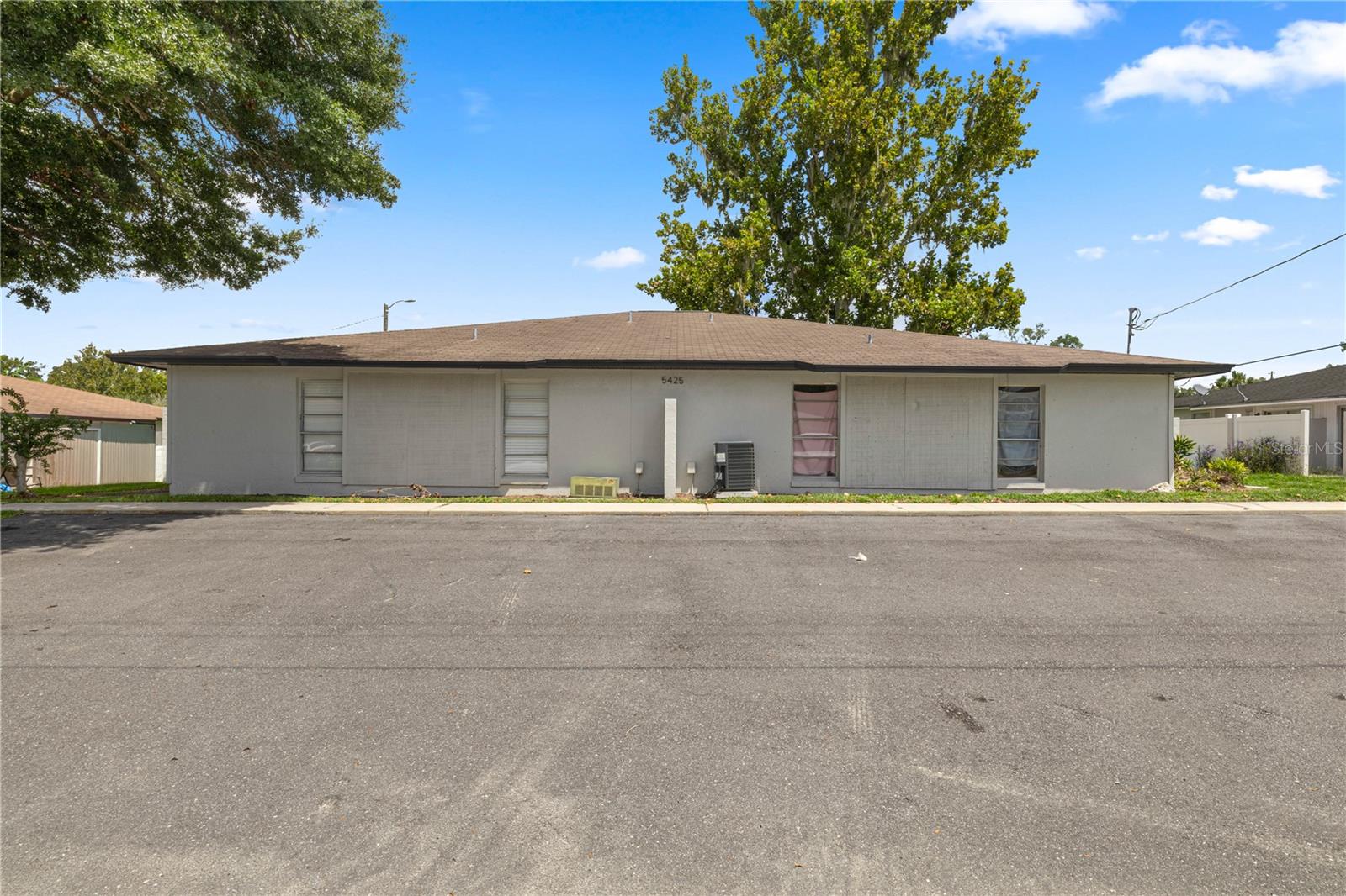 Located within community of The Greenfields in the desires SE area of Ocala conveniently located near Forest High school and with close proximity to shopping centers and local parks. This unit offers 2 bedrooms and 2 bathrooms. Kitchen has stainless steel appliances, quartz countertops and equipped with a dishwasher. There are washer and dryer hookup for your convenience. Primary bedroom has an ensuite bathroom. Second bedroom is ample and full bathroom is located right off the hallway. Notable features included : blinds on windows, ceiling fans, central AC and heat, private patio, private parking, Marion County Utilities for water, City of Ocala for Electric and there is a $45 fee trash and sewer. Verifiable income of 2x the rent, background and credit check required