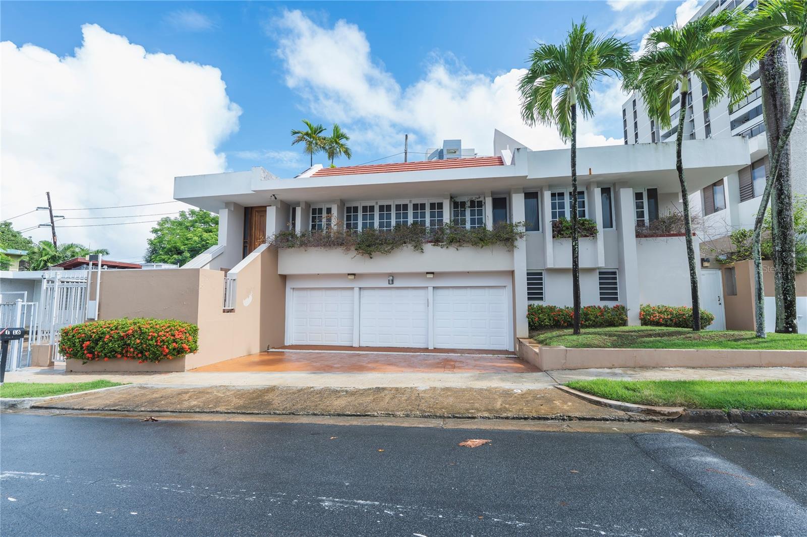 Located in a gated community with 24/7 security, this property offers approximately 4,100 sq. ft. of interior space on a 675 sq. m. lot. It features 4 bedrooms, 4.5 bathrooms, a pool with jacuzzi, a 3-car garage, a 20 kW LP gas generator, and an elevator. The first level includes the garage, a family room, 1 bedroom, and 1 full bathroom. On the second level, there are 3 bedrooms, two of which have private bathrooms, a half bathroom, a foyer, a kitchen with a breakfast nook, a living room, a dining room, and a laundry area. It is an excellent location, just steps from San Patricio Plaza.