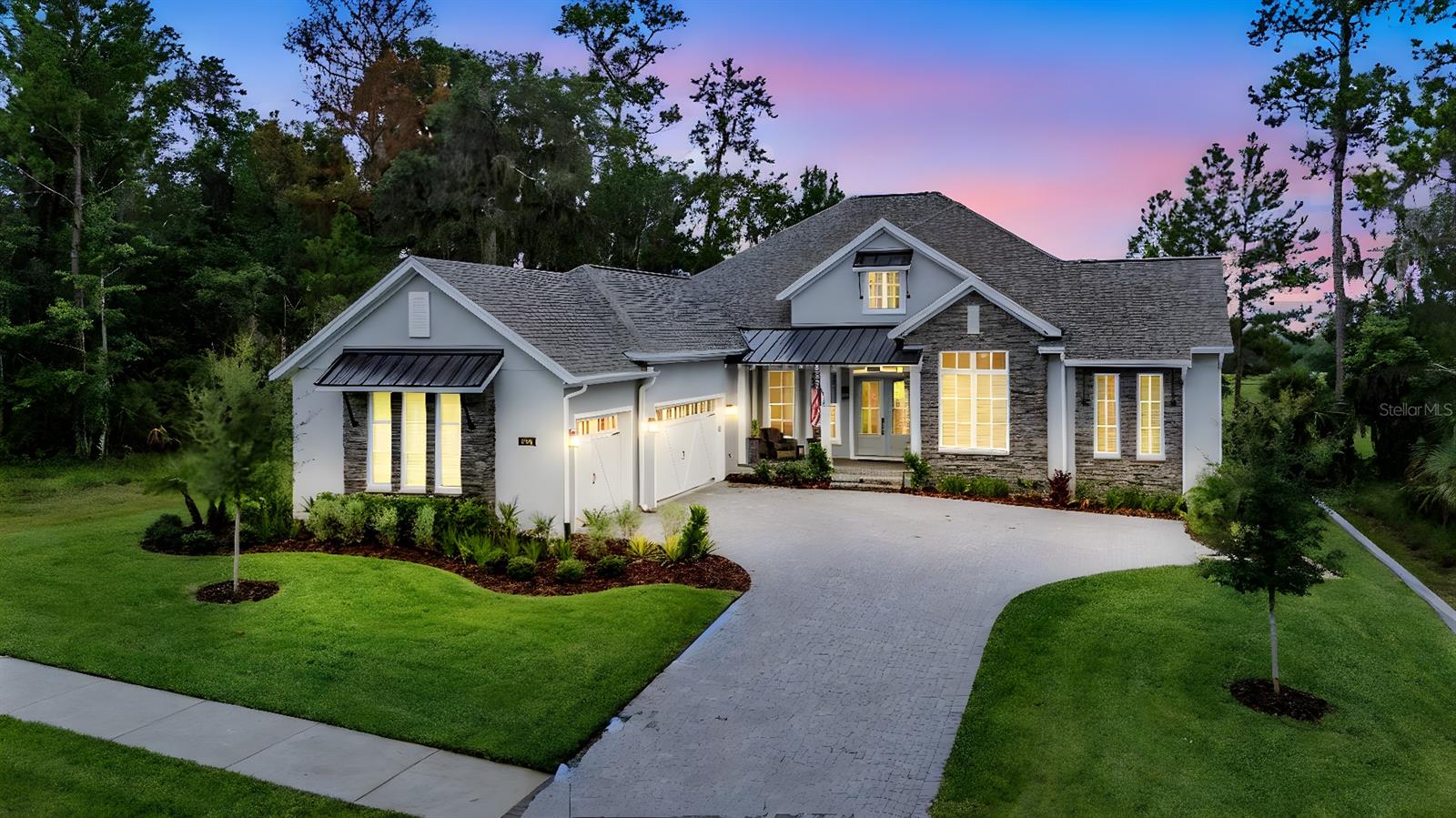 One or more photo(s) has been virtually staged. Live the Life of Luxury in this Beautiful Home in Southern Hills Plantation! Welcome to 6504 Summit View Drive - a beautifully designed 4 Bedroom, 4 Bath, with an Office Home nestled on the 6th Hole of the prestigious Southern Hills Plantation community. This 2025 Home offers a perfect blend of elegance and comfort and features a Primary Suite with 3 smaller Bedroom Suites, ideal for multi-generational living, extended guests, or a private owner’s retreat with flexible use options. You will love how the home is tucked up high on this large lot with its long paver driveway. Stroll up the front covered patio into the large Foyer. From the moment you step inside, you’ll be greeted by high ceilings, abundant natural light, and refined finishes throughout. The open-concept layout flows seamlessly from the Living Room, Dining area, Gourmet Kitchen then to the Family Room, perfect for entertaining or relaxing in style. Step outside to enjoy the covered Lanai with Outdoor Kitchen, fully fenced backyard with lush landscaping, all set against the backdrop of Florida’s natural beauty and 6th hole of the 18-hole Pete Dye Championship Golf Course. Back into the home you will appreciate the upgraded options with a solid wood beam the length of the home, a matching mantle over the electric fireplace, can lighting, fans, chandelier and top of the line faux wood tile flooring throughout the home. The Gourmet Kitchen is loaded with every upgrade to include ceramic sink, an extended granite island with additional storage and wood shelving in the pantry. Nothing but the best in gas range and appliances for this home. The large Primary Suite is tucked away with a view of the backyard and golf course with a 2 large closets and a large ensuite bathroom. Off the foyer is the office with French doors and the 1st of 3 bedroom suites. This suite is the larger of the 3 and nicely tucked away for privacy. Off the kitchen you will find the additional 2 Bedroom Suites, Laundry Room and Mud Room off the garage. The Bedrooms are nicely sized for a growing family. The Laundry Room includes custom cabinets and a utility sink. The Mud Room has additional storage for organizing your daily needs upon stepping in from the 3 Car oversized Garage with epoxy flooring and additional storage. This home has it all and is waiting for you to make it your own! Southern Hills Plantation is one of Hernando County’s premier gated golf communities, offering resort-style amenities including an 18-hole Pete Dye championship golf course, resort pool, tennis courts, fitness center, spa, and clubhouse dining. Residents also enjoy tree-lined streets, walking paths, and 24/7 manned security for peace of mind. Located just minutes from historic downtown Brooksville, with easy access to Tampa via the Suncoast Parkway, this home offers a tranquil lifestyle with convenience to shopping, dining, and medical services. Schedule your private showing today and experience all that Southern Hills has to offer!!