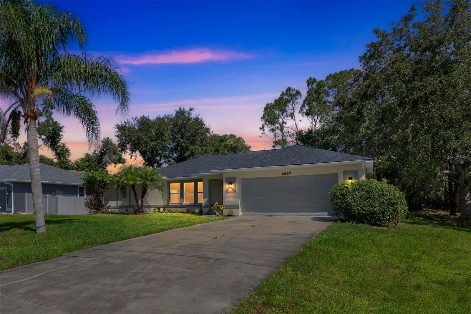 One or more photo(s) has been virtually staged. Fully Renovated Gem in Prime North Port Location – Just 30 Mins from the top rated Venice Beach!
Step into modern comfort in this beautifully renovated home featuring European-style cabinets and appliances, a spacious living room, and a dedicated dining area off the kitchen. Enjoy outdoor living on the screened porch—perfect for the grill master—and relax in the oversized backyard. And let's not forget the walk-in closets!
Major updates include a brand new roof, state-of-the-art bathrooms, stunning kitchen, and sleek laminate flooring throughout. Laundry room comes ready with washer/dryer hookups.
Enjoy the double garage space, turn it into an in-law suite, or into a rental separate from the house. The choice is yours! The driveway will undergo renovation this week, and virtual staging is also coming this week. The seller will also put a washer and dryer in the laundry room at their expense by 7/17.
Conveniently located near top-rated schools, shopping, dining, and more. Don’t miss this move-in-ready masterpiece!