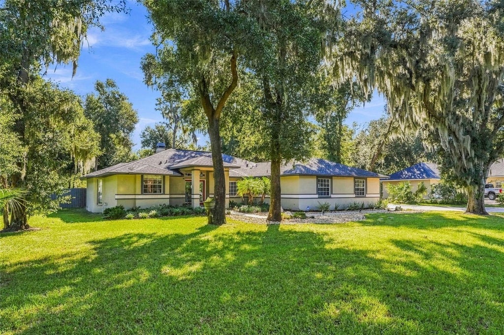 Photo of 8416 Southwood Oaks Street, Lithia, FL 33547 (MLS # TB8560876)