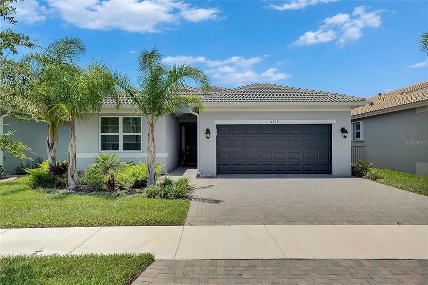 4915 Sienna Isles Ave | Grenada Floorplan 3 Beds | 3 Baths | Den/Office | Lake View | Guard-Gated 55+ Community Welcome to active living in Valencia del Sol, a guard-gated 55+ community offering resort-style amenities and vibrant social living. This beautifully maintained Grenada floorplan by GL Homes features 3 bedrooms, 3 full baths, and a versatile den/office. Inside, enjoy an open-concept layout filled with natural light through hurricane impact windows and doors. Ceramic tile flooring, crown molding, and a chef’s kitchen with a gas range, pantry, granite counters, and 4-seat bar top make entertaining easy. The spacious primary suite offers a walk-in closet and a spa-like bath with split vanities, a water closet, and a linen cabinet. Two guest bedrooms and two additional full baths give plenty of room for visitors or hobbies. Step outside to the covered, screened lanai with peaceful lake views, perfect for coffee or winding down. Enjoy access to a 25,000 sq ft clubhouse, resort pool, tennis & pickleball courts, fitness center, bistro, and a long list of clubs and social events—from food trucks and poolside concerts to poker nights, culture groups, and dog meetups. Low-maintenance, full-of-life living—schedule your private tour today!