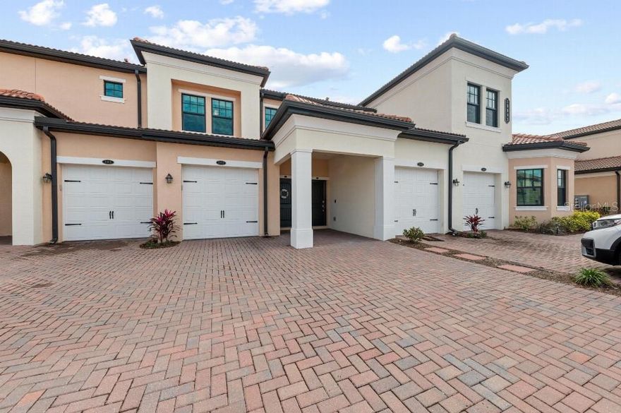 Spectacular 3 bedroom, 2 bath condo in the vibrant, amenity-rich community of Sarasota National. This maintenance free open floor plan condominium features gourmet kitchen equipped with quartz countertops, abundance of cabinets, huge counter height island, stainless steel appliances and a closet pantry. The owner suite has a en-suite bathroom with an immense clear glass enclosed walk in shower, double sink quartz vanity, private water closet as well as an enormous walk-in closet. With two additional bedrooms, you have plenty of room for family or guests.The lanai overlooks 1,300 acres of  preservation, conservation for your privacy and relaxation, with custom ambience lighting, and an electric Hurricane screen for safety and shade.  The elegant finishing touches include tile roof, brick paver driveway, epoxy garage floor finish, hurricane impact sliding glass doors, electric hurricane screen on Lanai, 9 foot ceilings with crown molding along with sealed designer tile floors through out the main condo, Vinyl flooring in all the bedrooms, closets & stairwell, sealed shower wall tile, pendant lights, ceiling fans in all rooms, ceiling vents in the bathrooms, and storage closet in the laundry room. Amenities include Clubhouse, Palm Club Lounge and Restaurant , pool side Tiki Bar, Coffee room, library, Fitness Center, Spa treatment rooms, Resort Pool with lap lanes and  beach zero entry, Tennis courts, Pickleball, Bocce, and a Dog Park. Florida entertainment is minutes away with local beaches, Wellen Park, Cool Today Park and quaint downtown Venice shopping galore! Schedule a showing today to see this limited sought after 6 plex condo!