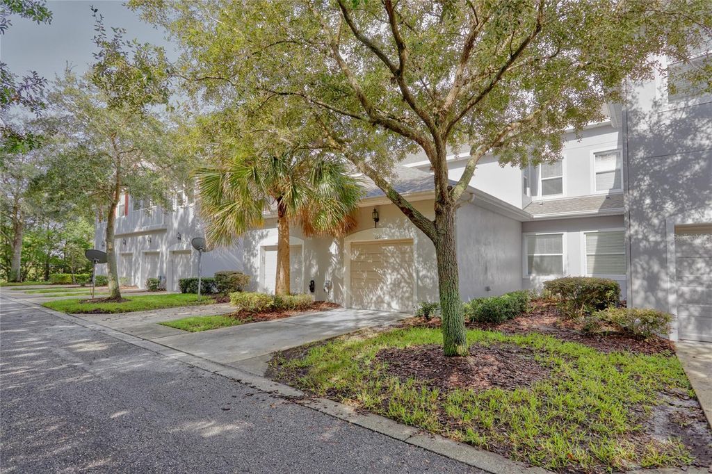 Photo of 9410 Georgian Park Lane #105, Tampa, FL 33626 (MLS # TB8494483)